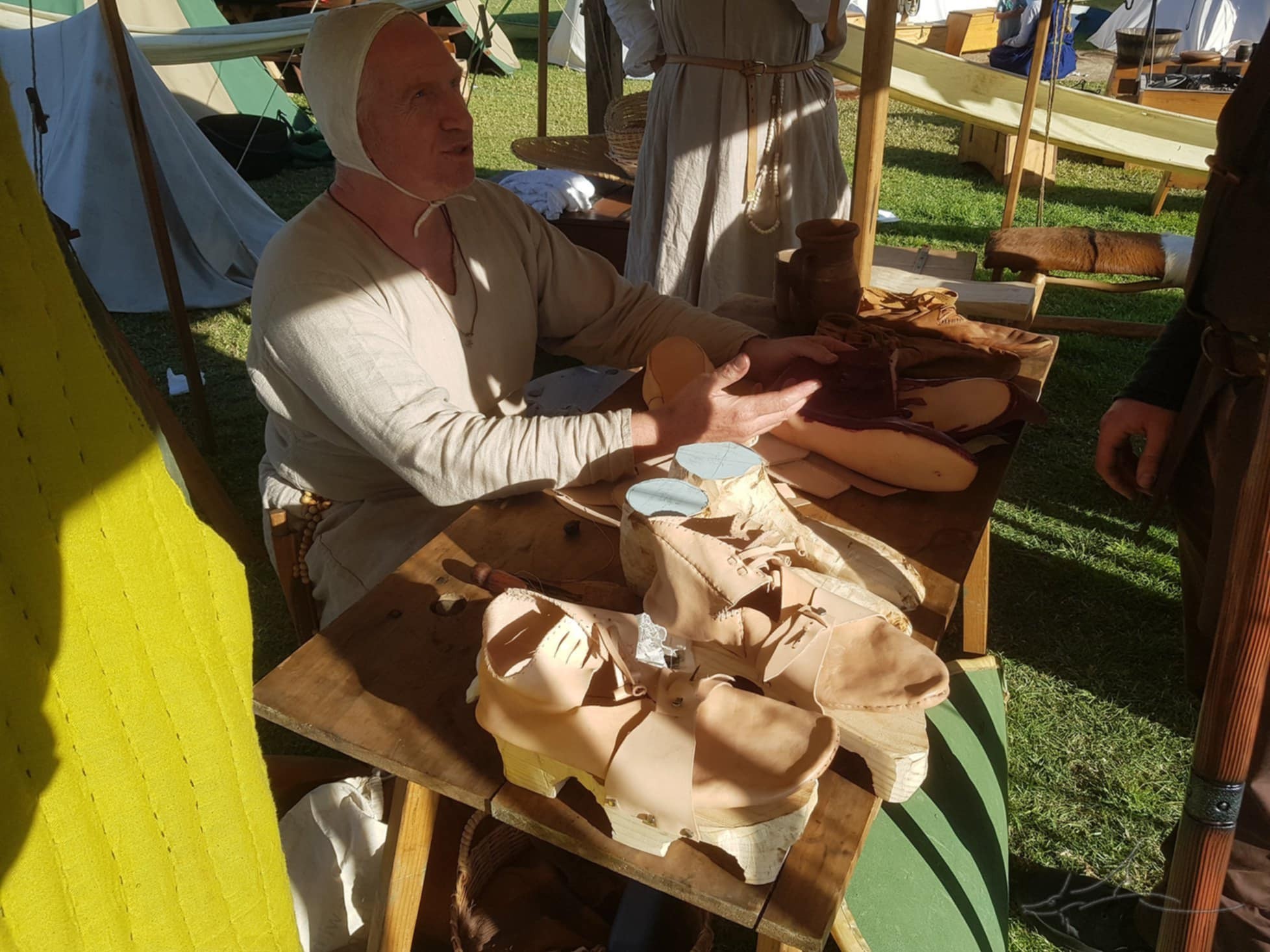 Historical merchant display at a medieval camp
